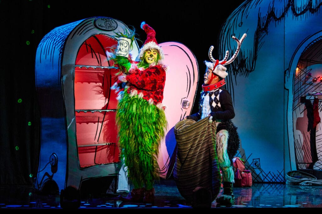 The Grinch & Max during How the Grinch Stole Christmas the Musical