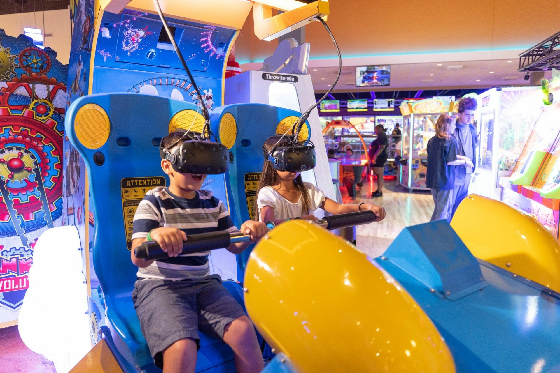 Two children with VR Headset playing games