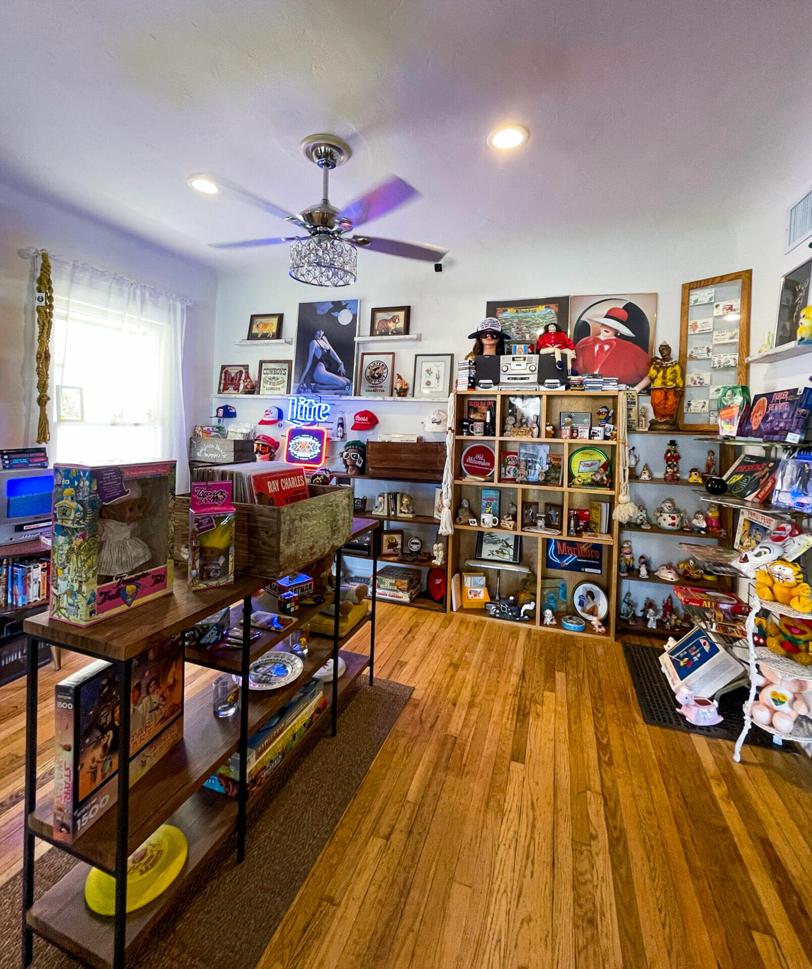 A multitude of vintage items for sale at a vintage store.