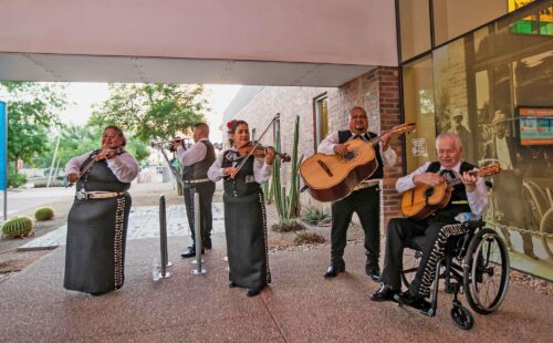 A 5-person Mariachi band plays music at the City of Tempe Tardeada event.